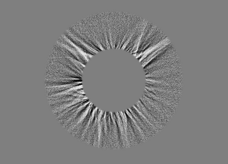 Single exposure of the eclipse but filtered so that it only shows the low-contrast structure of the corona